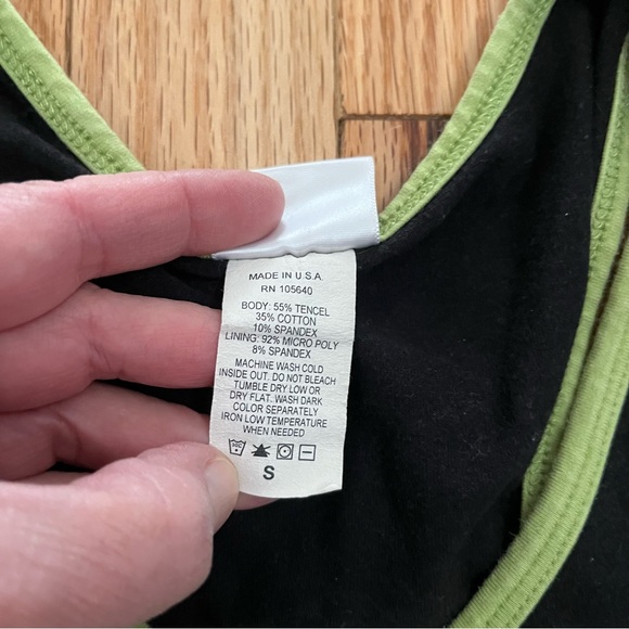 So Sporty a brand under Nanette Lepore. It features a black body with green trim - Picture 4 of 7